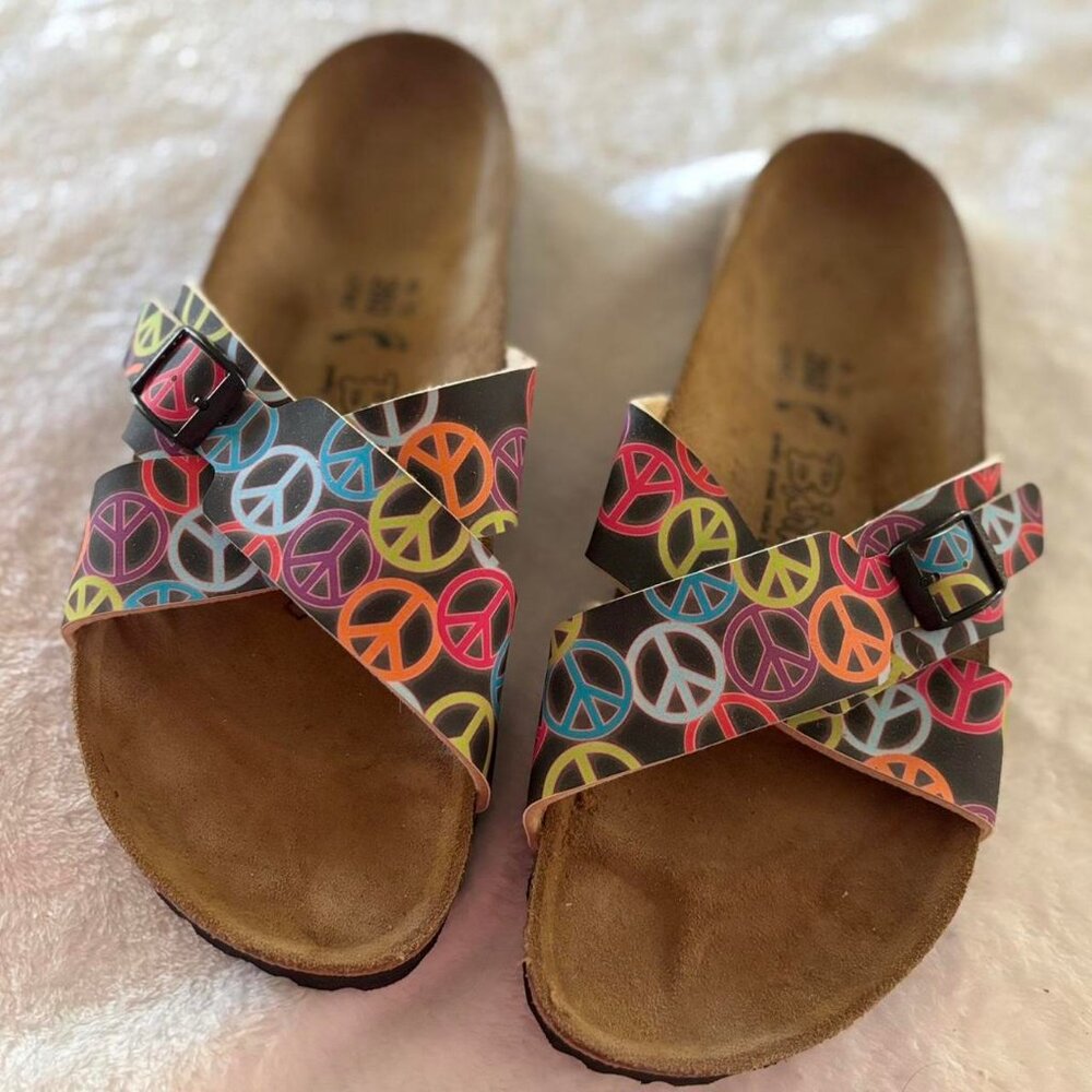 SIZE 9 - BIRKENSTOCKS -Women’s Peace Sign Print Cross-Strap Sandals